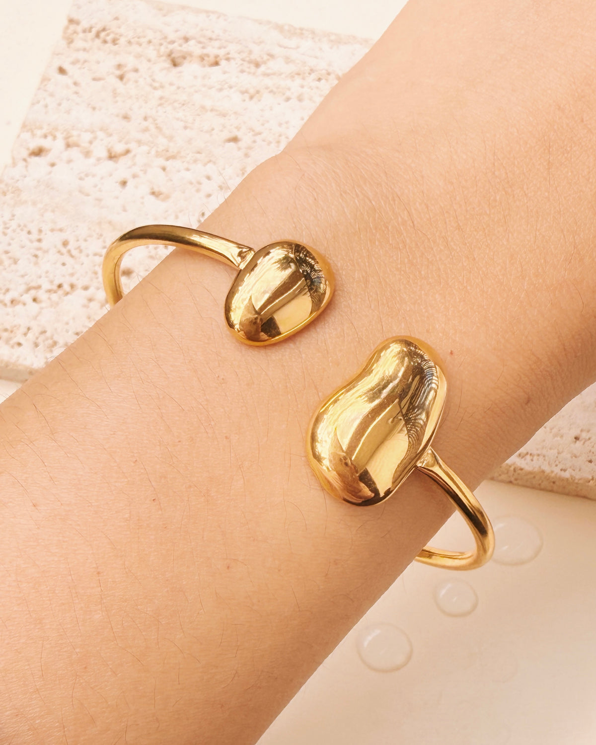 Junna Dual Tip Irregular Bean Shaped Rounded Flat Design Gold Bangle