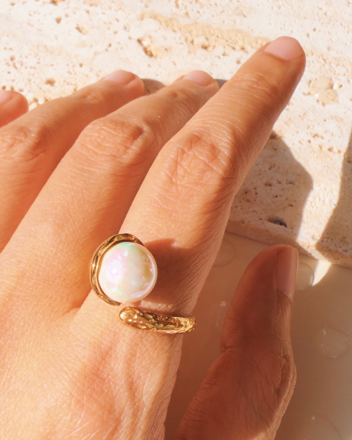 Nelia Big Round Pearl Top Head Side Design Textured Hammered Design Gold Open Ring