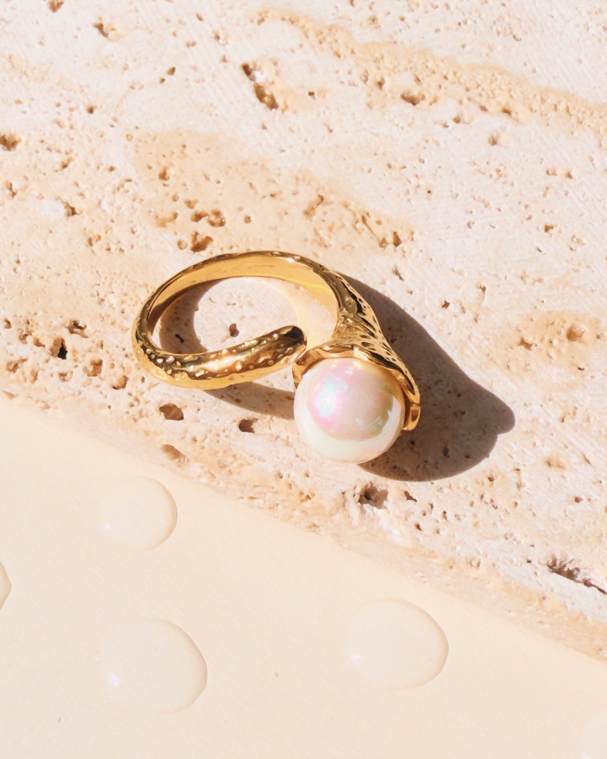 Nelia Big Round Pearl Top Head Side Design Textured Hammered Design Gold Open Ring