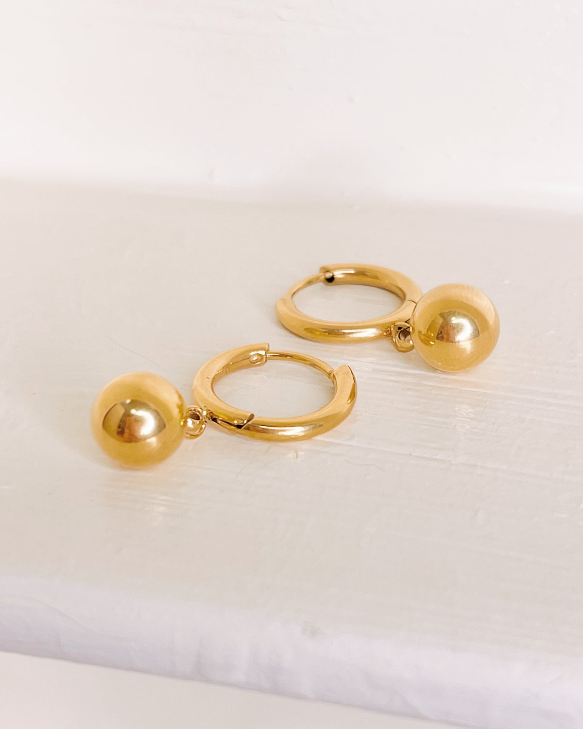 Angelique Solid Ball Dangle Gold Huggies