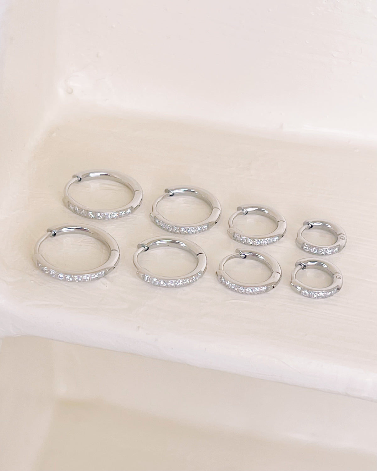 Beatrice (Silver) Zircon Paved Round Huggies