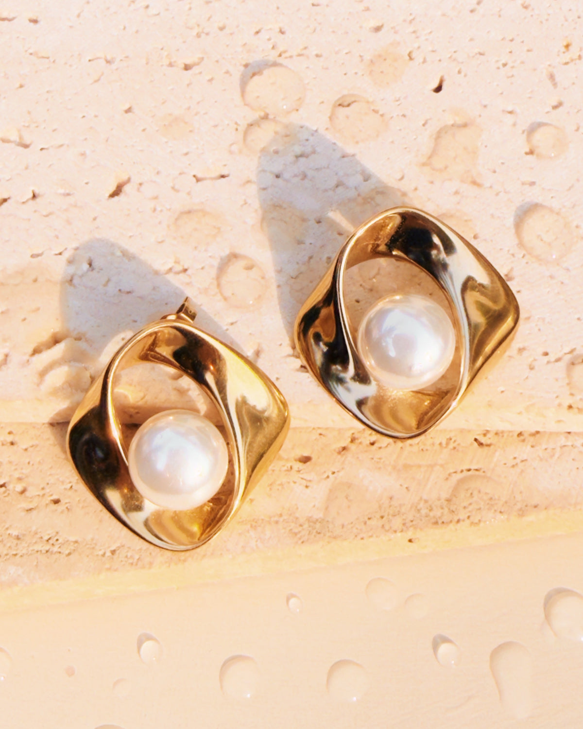 Mireya Chunky Pearl Middle Nested Eye Shaped Design Stud Drop Earrings