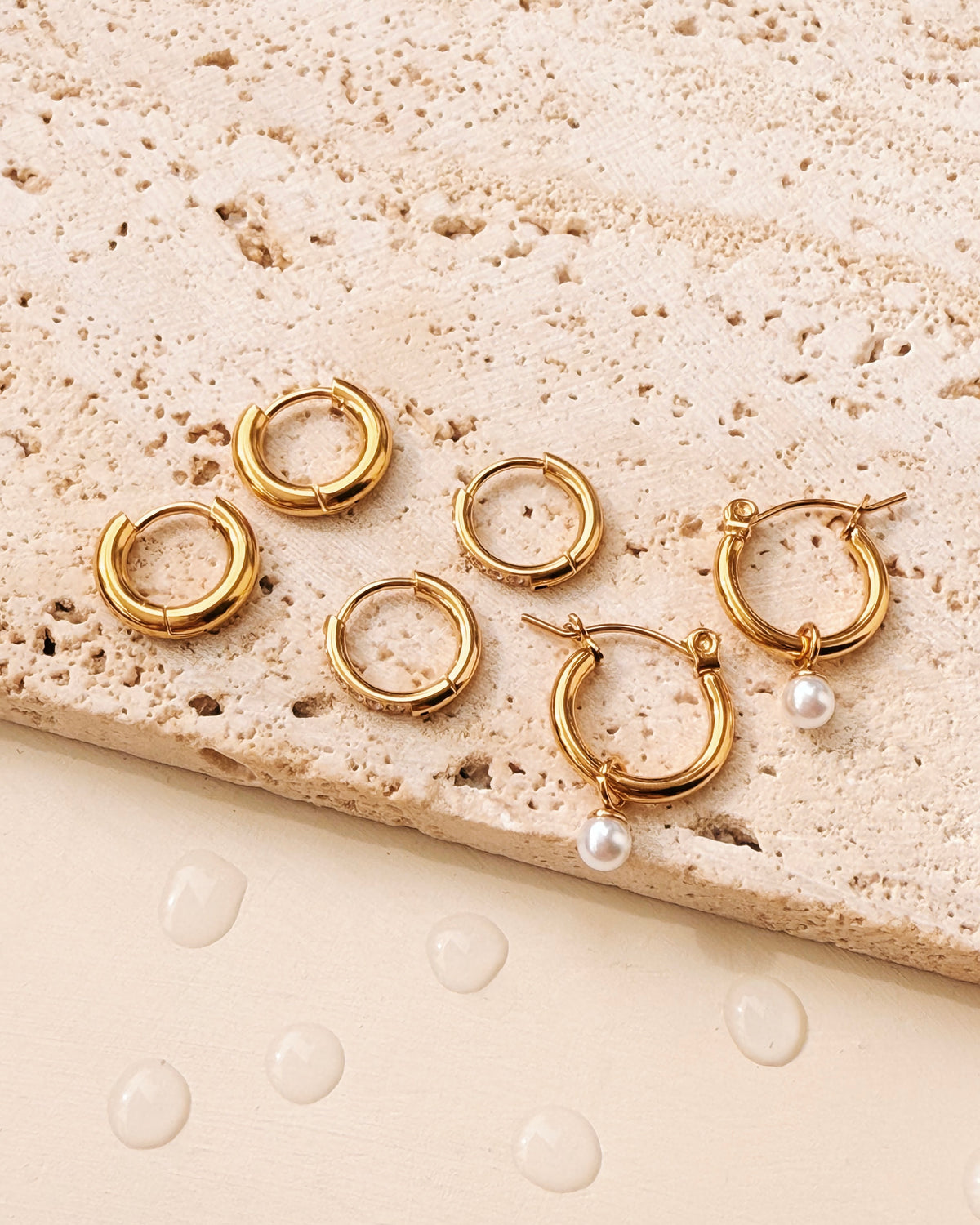 Jessalyn (Bundle Set) 3 Pairs Classic Zircon Paved Gold Huggies Classic Gold Huggies Pearl Dangle Classic Round Gold Hoops