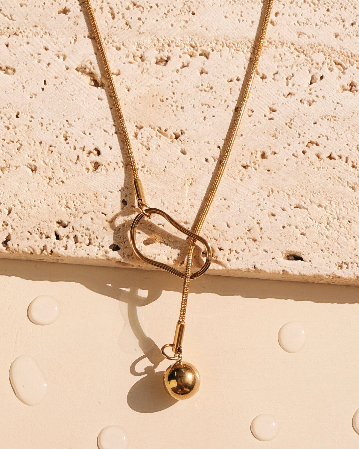Ezlyn Ball Drop Pendant Thin Snake Chain Pull String Lock Design Gold Necklace