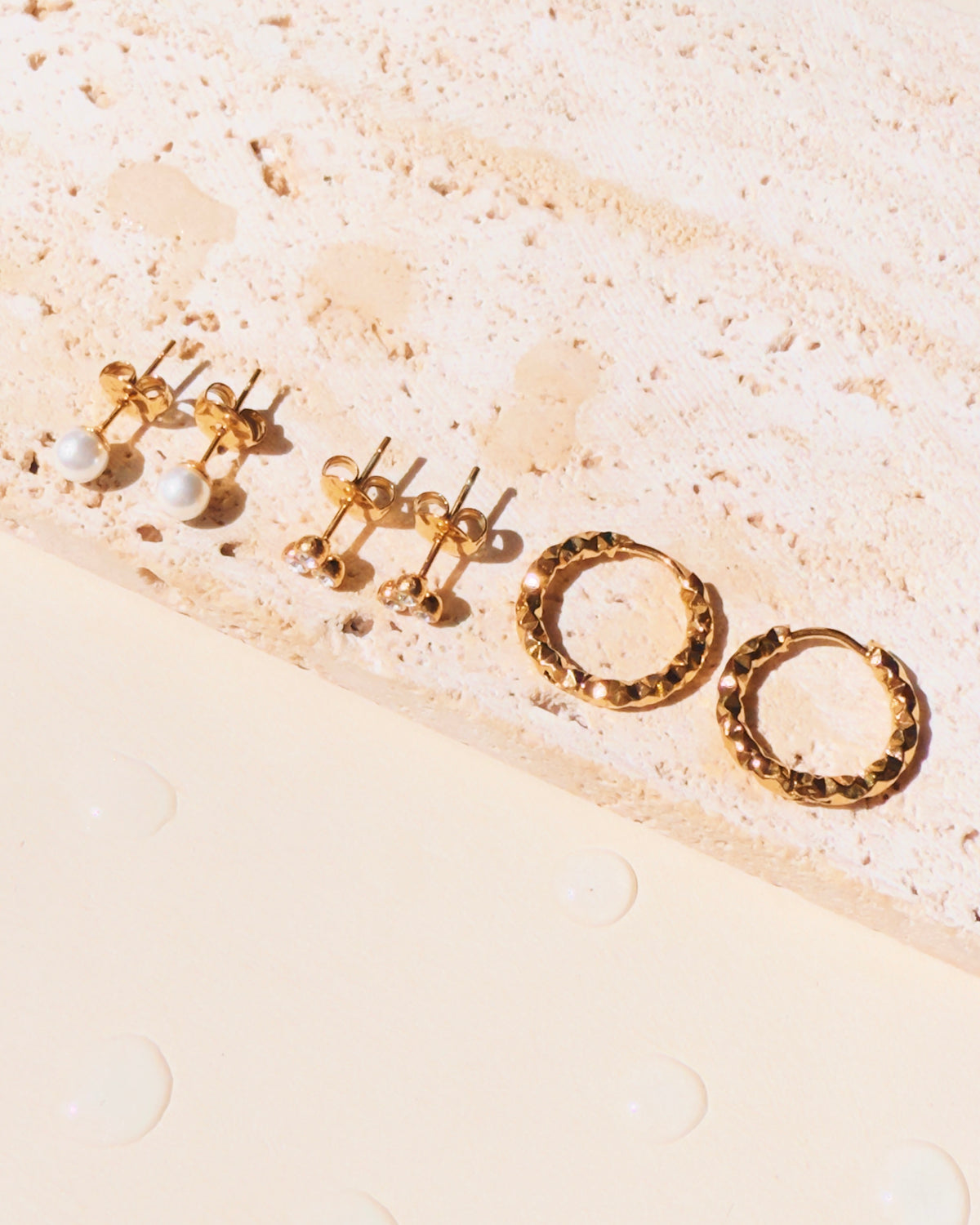 Quincy (Bundle Set) 3 Pairs Round Pearl Gold Studs Tri Petal Zircon Bezel Set Flower Shaped Gold Studs Textured Faceted Design Gold Huggies