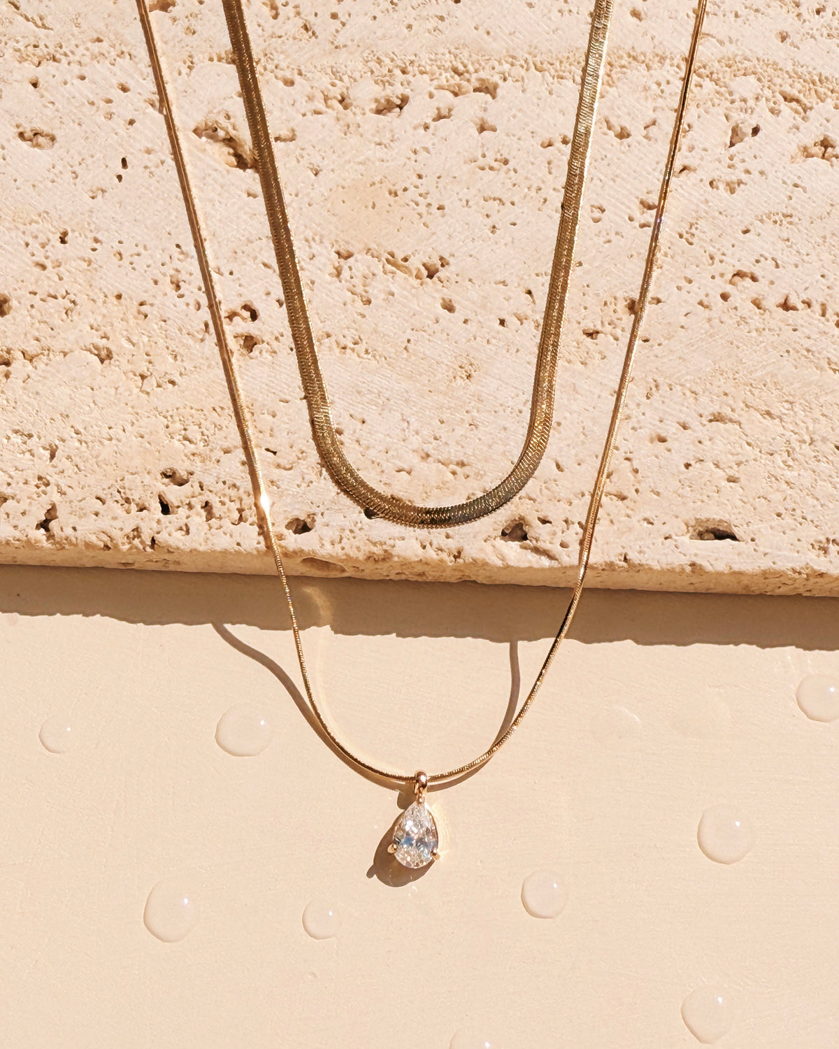 Irma Double Layer Teardrop Waterdrop Shaped Zircon Crowned Set Pendant Flat Wide Snake Chain Thin Rounded Snake Chain Gold Necklace