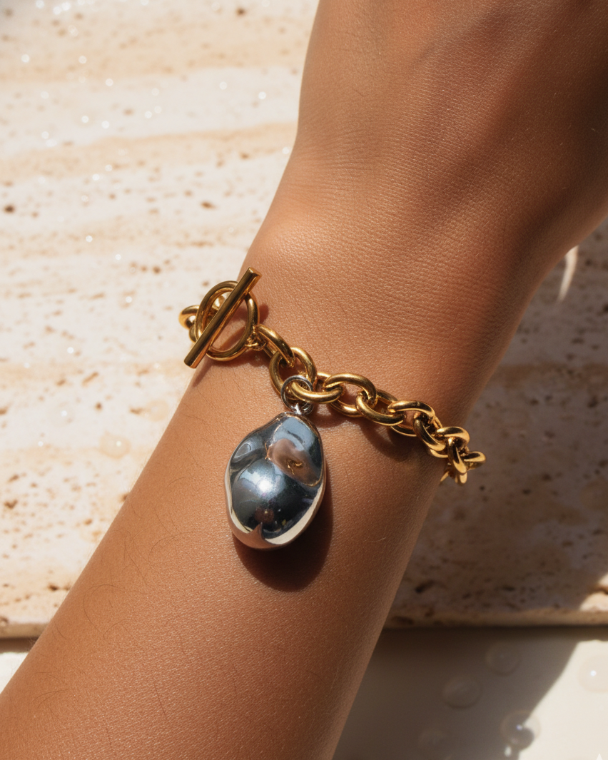 Qyraelle Two Tone Chunky Silver Irregular Stone Shaped Design Pendant Chunky Gold Rounded Link Chain OT Lock Bracelet