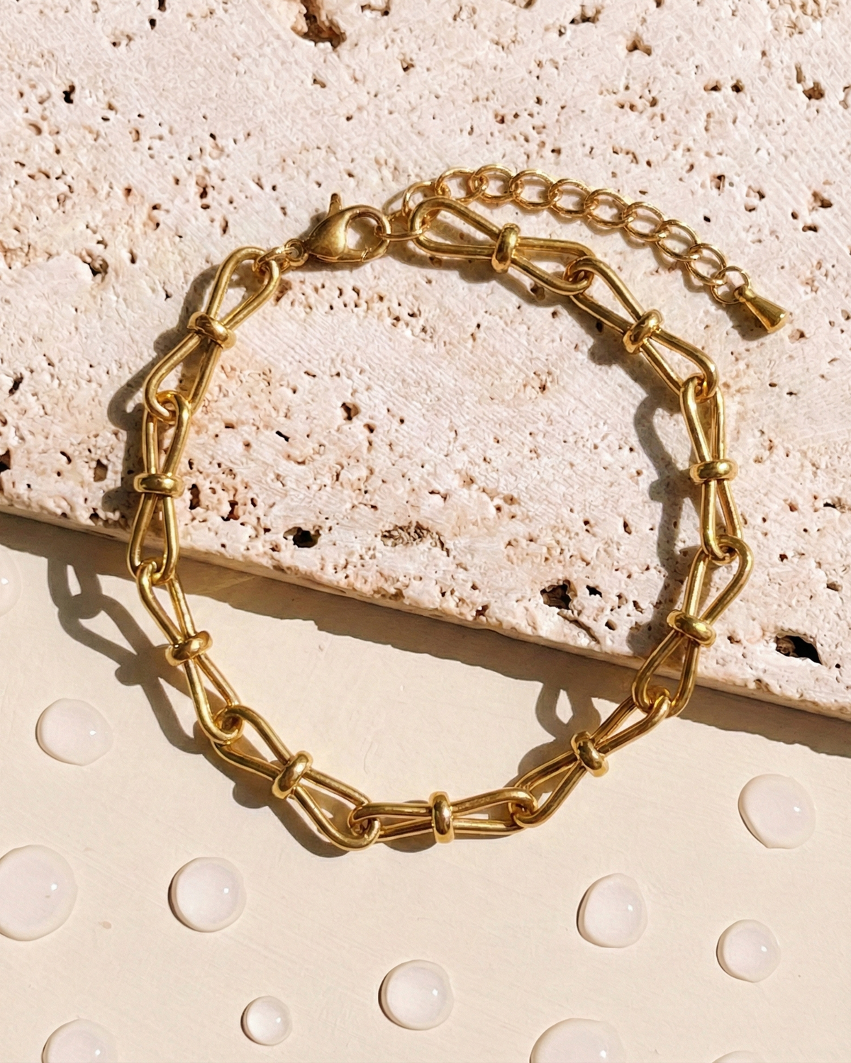 Lyorin Knot Tie Chain Design Gold Bracelet