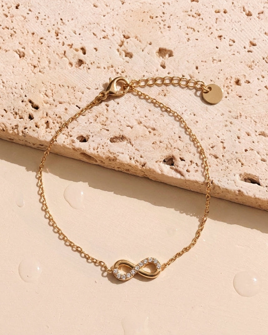 Solana (Gold) Zircon Paved Half Side Hollow Infinity Shaped Pendant Classic Thin Link Chain Gold Bracelet