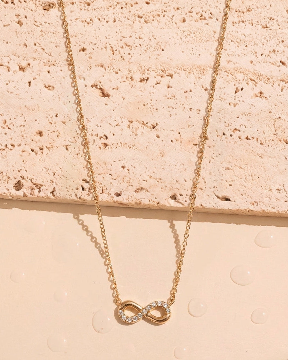 Somerset (Gold) Zircon Paved Half Side Hollow Infinity Shaped Pendant Classic Thin Link Chain Gold Necklace