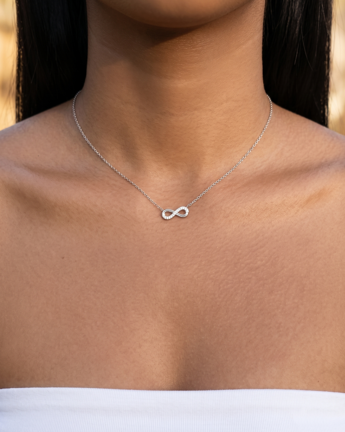 Somerset (Silver) Zircon Paved Half Side Hollow Infinity Shaped Pendant Classic Thin Link Chain Silver Necklace