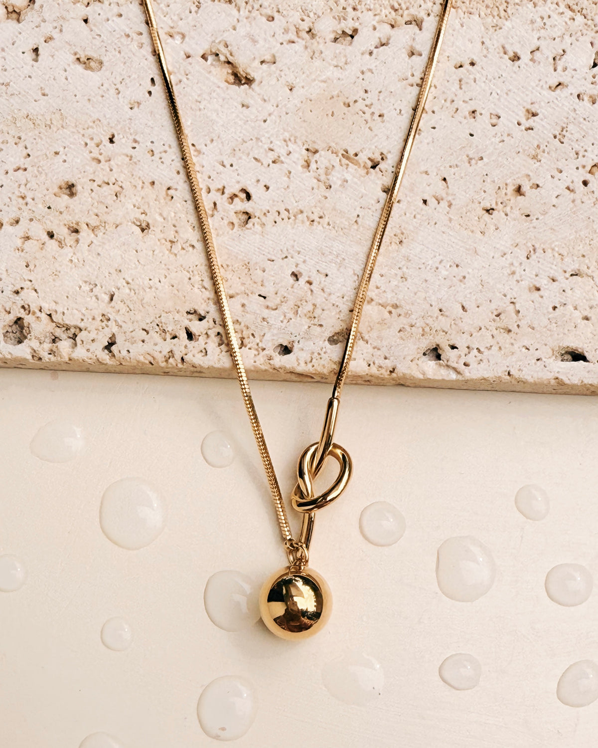 Hayden Knot Bar Side Pendant Center Solid Ball Drop Pendant Rounded Snake Chain Gold Necklace