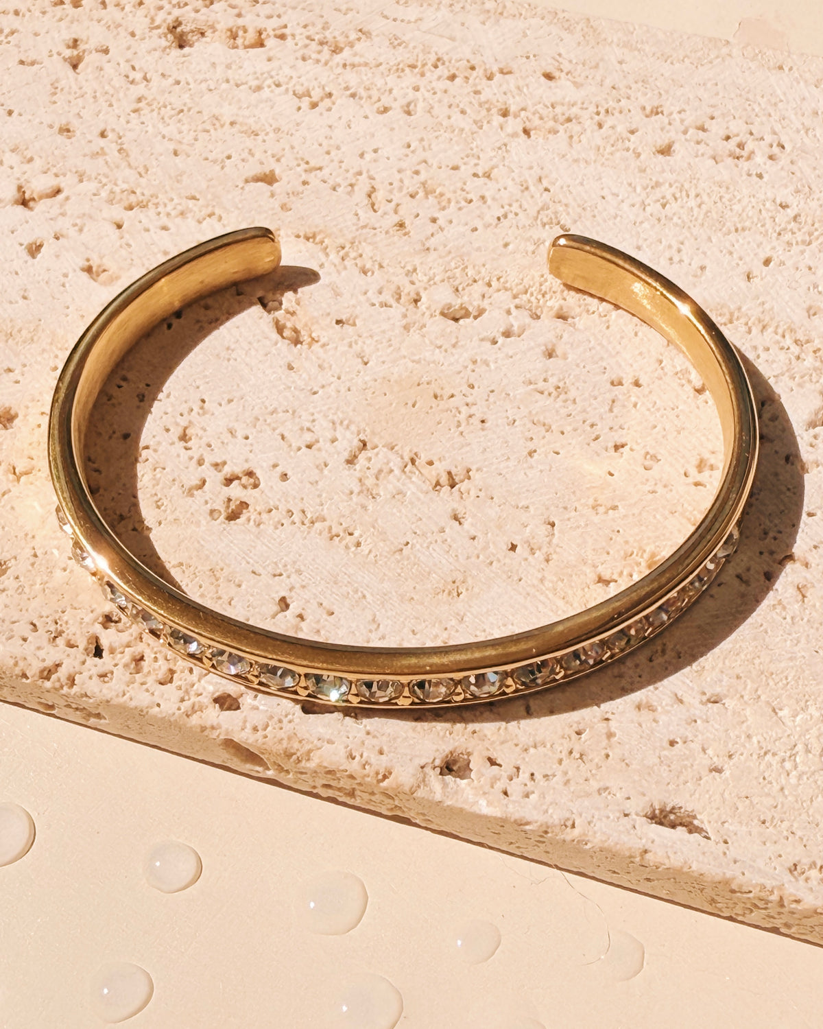 Halsey Rounded Zircon Inlaid Set Paved Gold Bangle