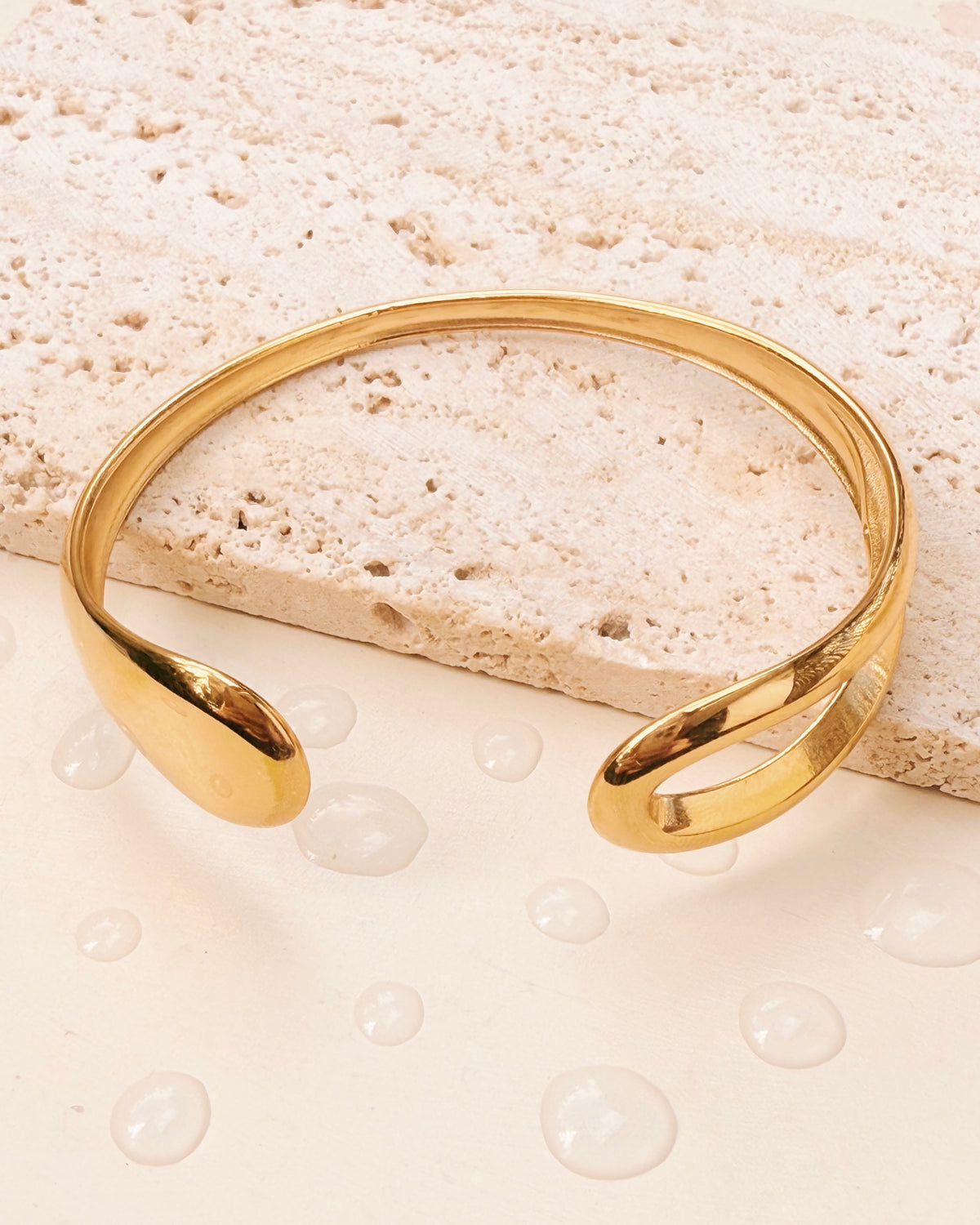 Kenna Flat Water Drop Wide Hollow Center Design Gold Bangle