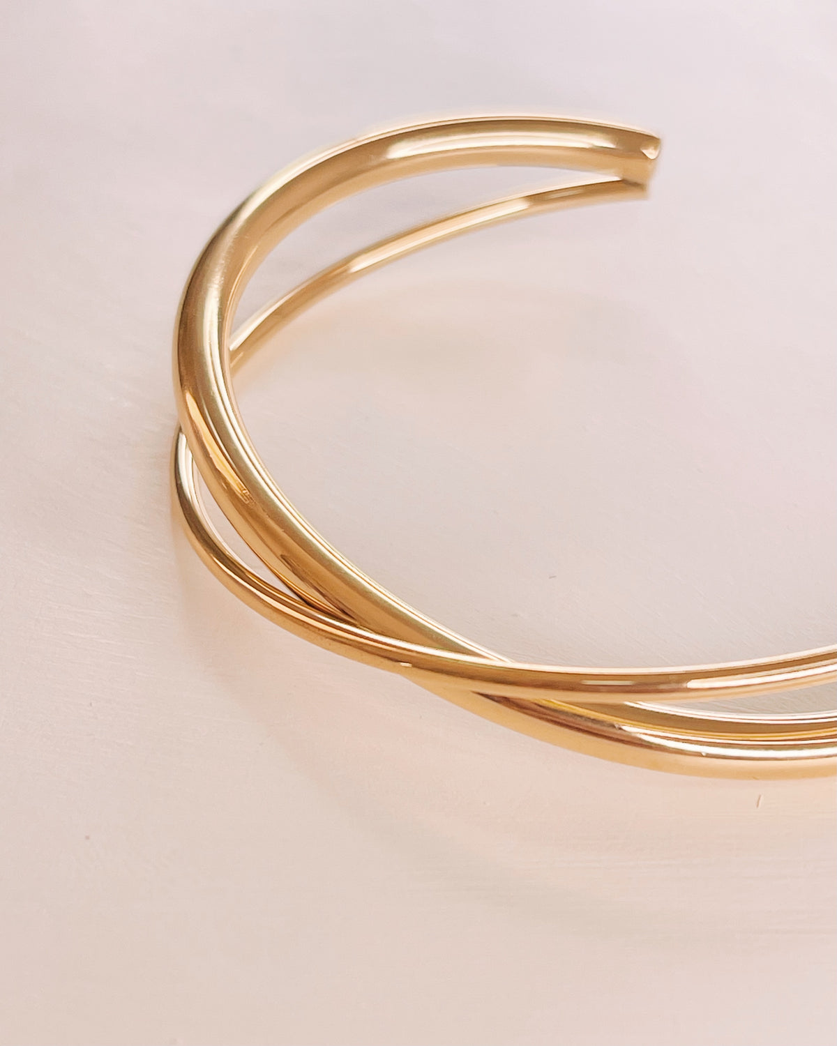Nellie Intertwined Design Gold Bangle