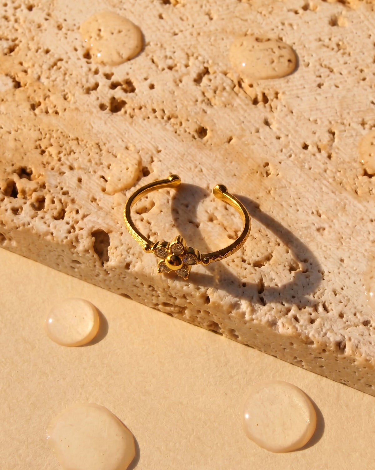Emer Flower Shaped Zircon Petals Bezel Set Top Head Textured Design Gold Open Ring