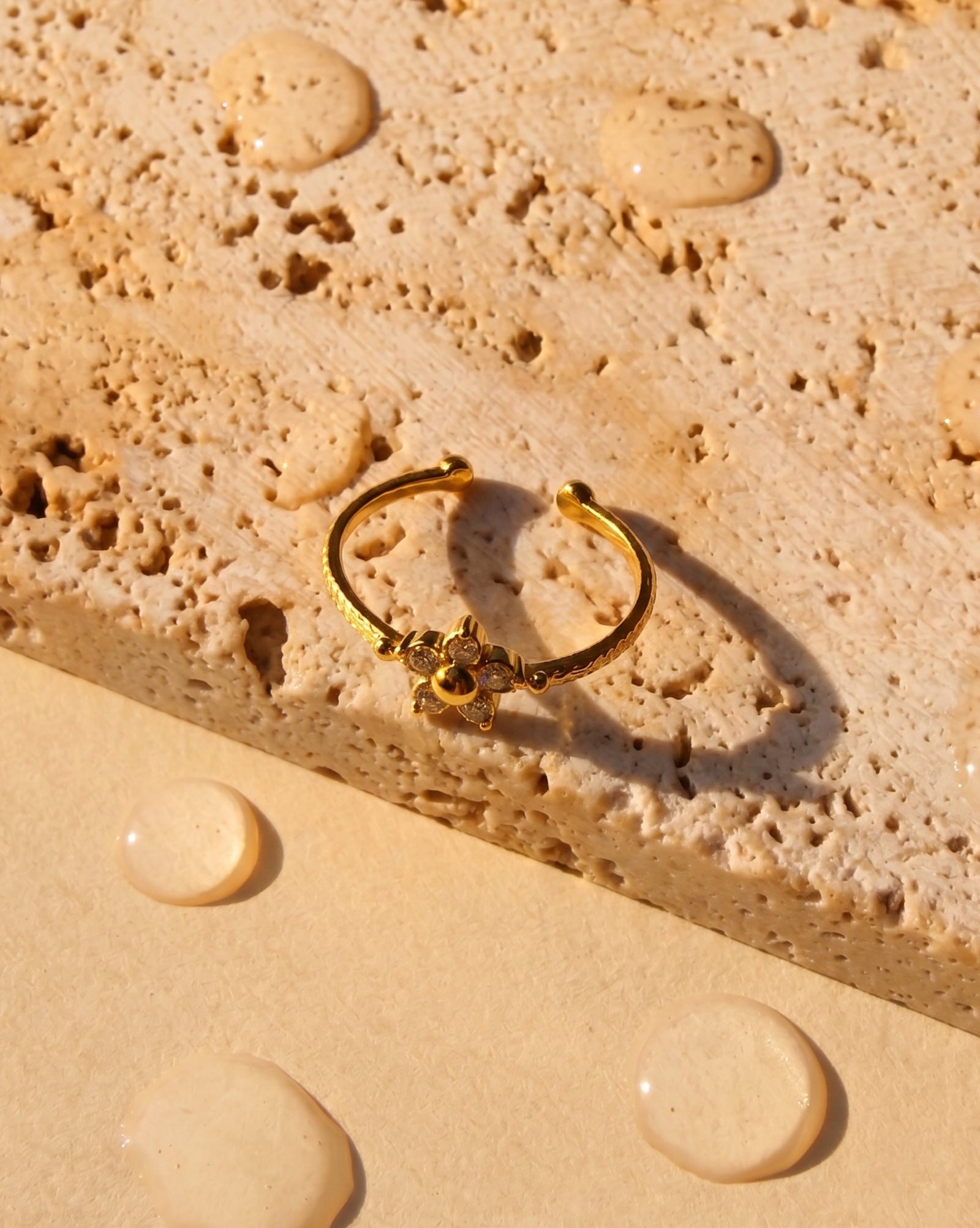 Emer Flower Shaped Zircon Petals Bezel Set Top Head Textured Design Gold Open Ring