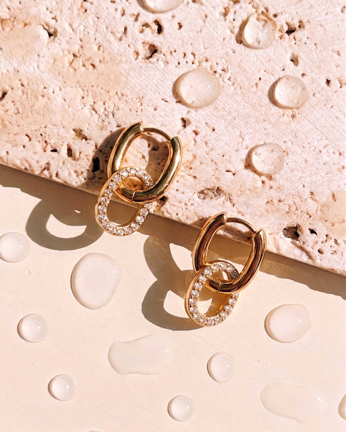 Gela Classic Oval Huggies Stacked Zircon Paved Oval Halo Design Gold Drop Earrings