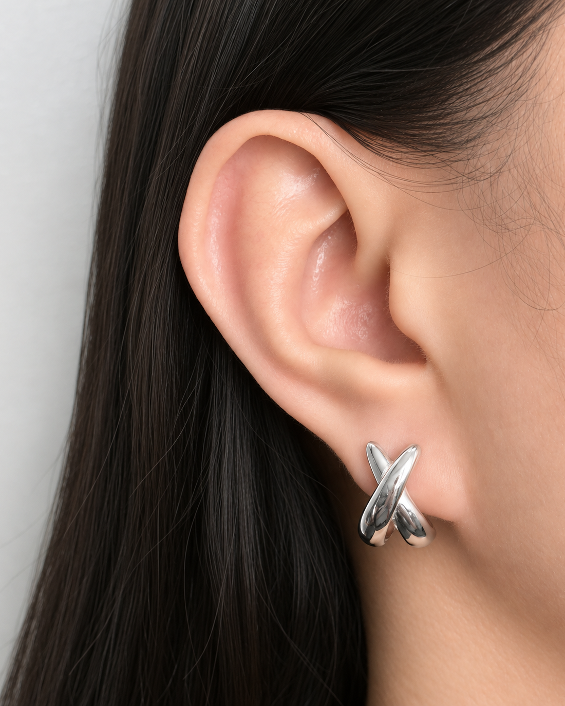 Idra (Silver) Intercrossed Flat C Shaped Huggies Silver Stud Earrings