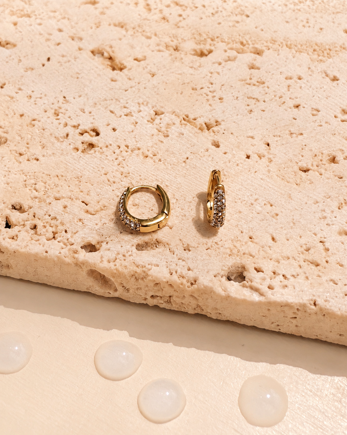 Katya Dainty Pear Shaped Zircon Front Paved Gold Huggies