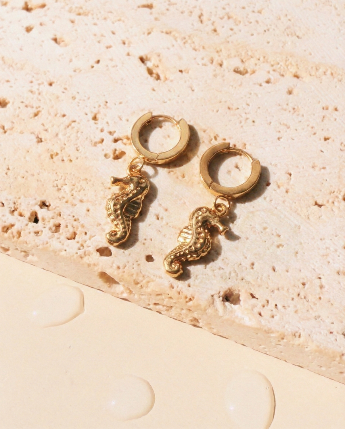 Parvella Thin Round Huggie Seahorse Shaped Gold Drop Earrings