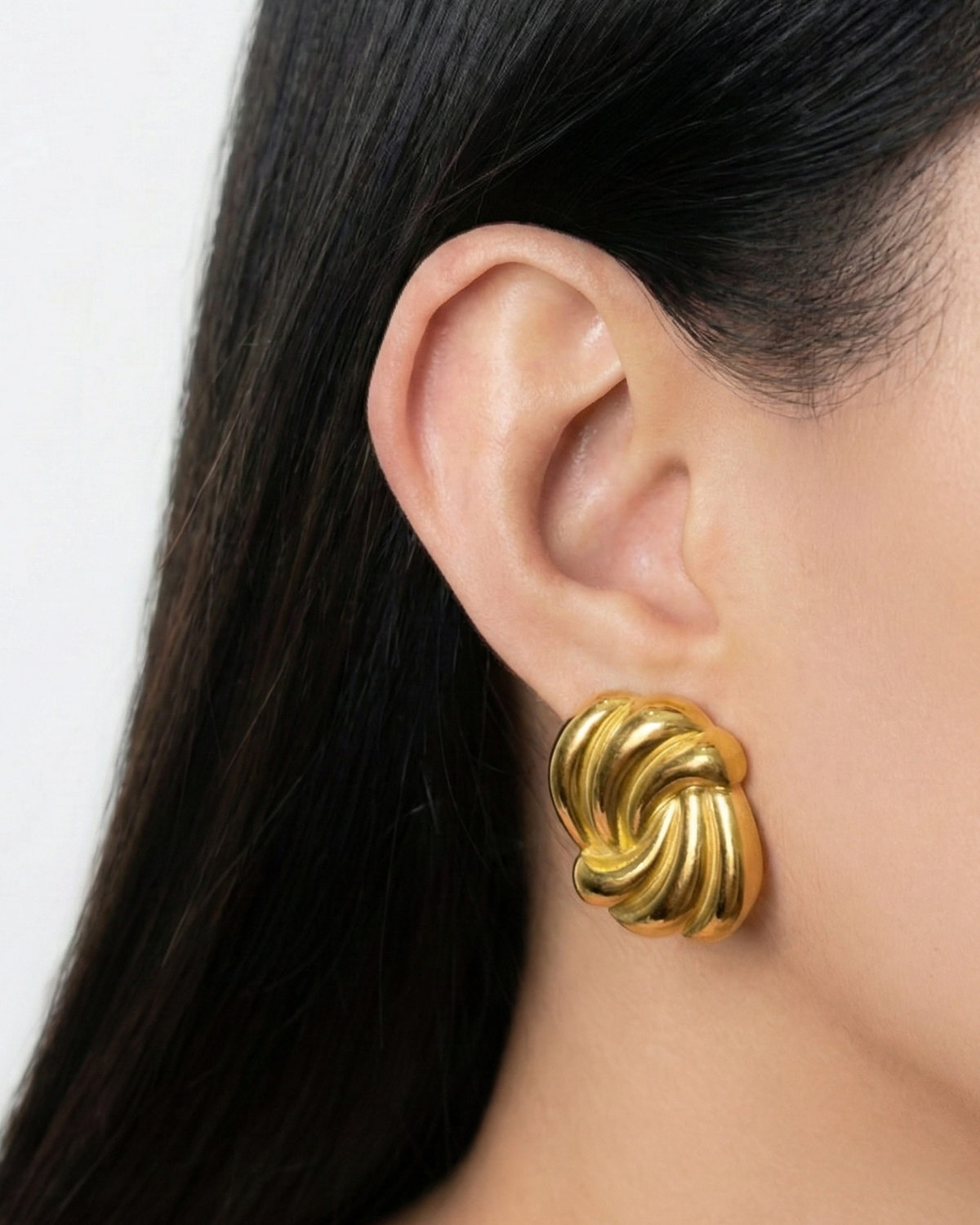 Rethira Oval Shaped Swirl Design Gold Studs