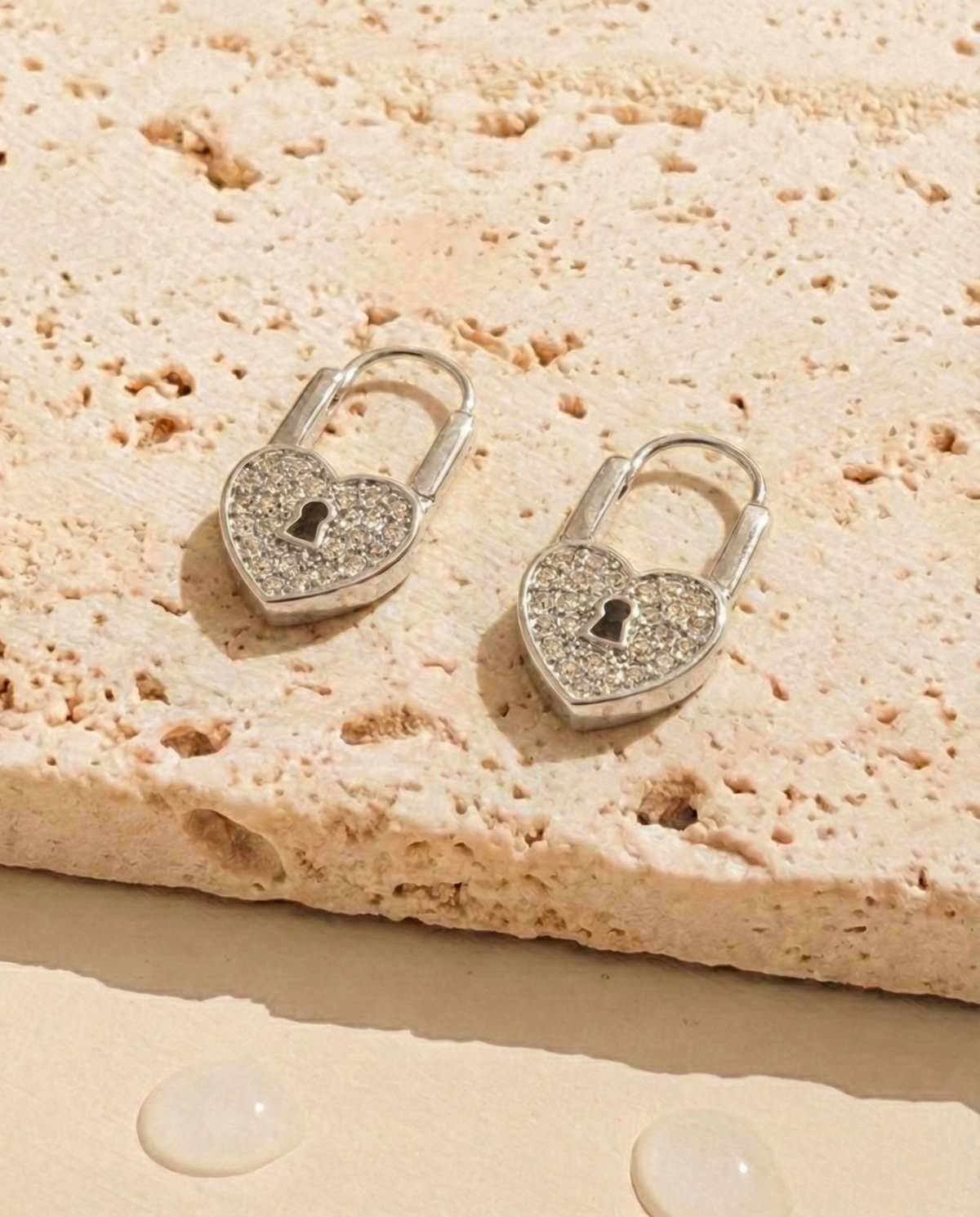 Serevia (Silver) Zircon Paved Heart Shaped Padlock Design Drop Earrings